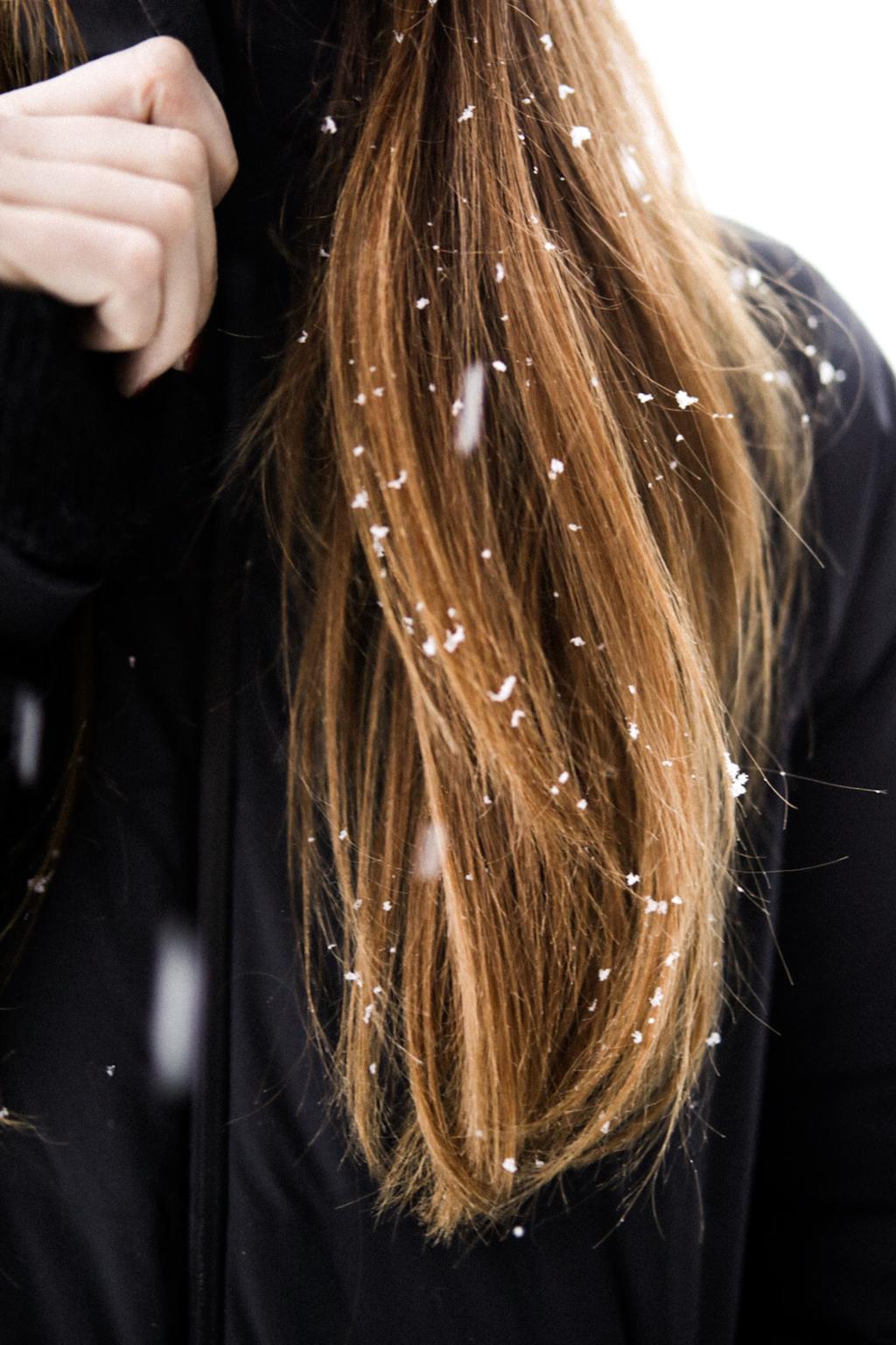 Snow falling on hair